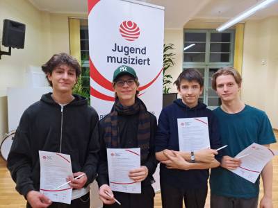 Giulio Berger, Julius Lobeck, Jakob Hölzel und Theodor Schulze